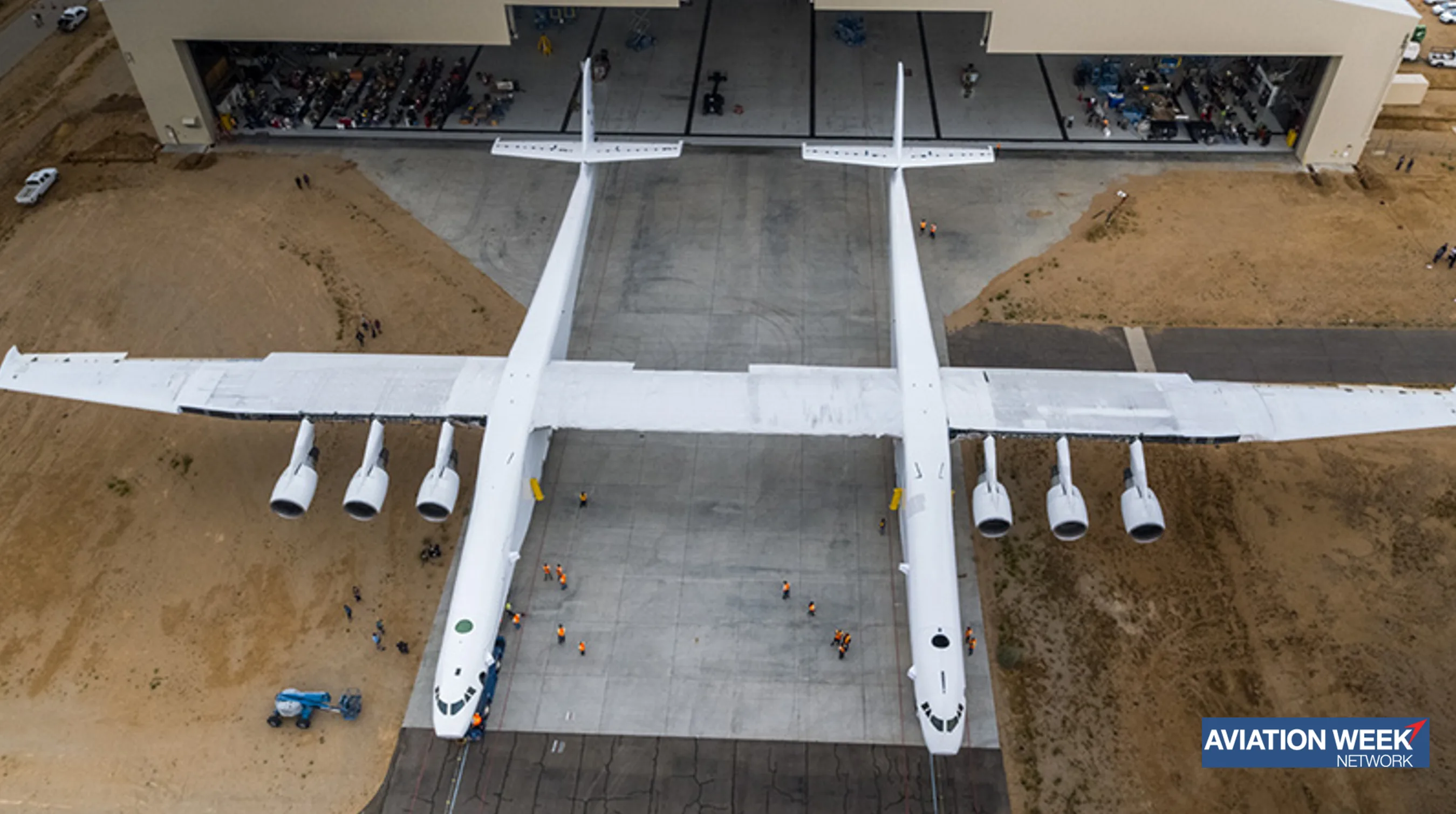 The Stratolaunch aircraft next to hangar, the world's largest aircraft.